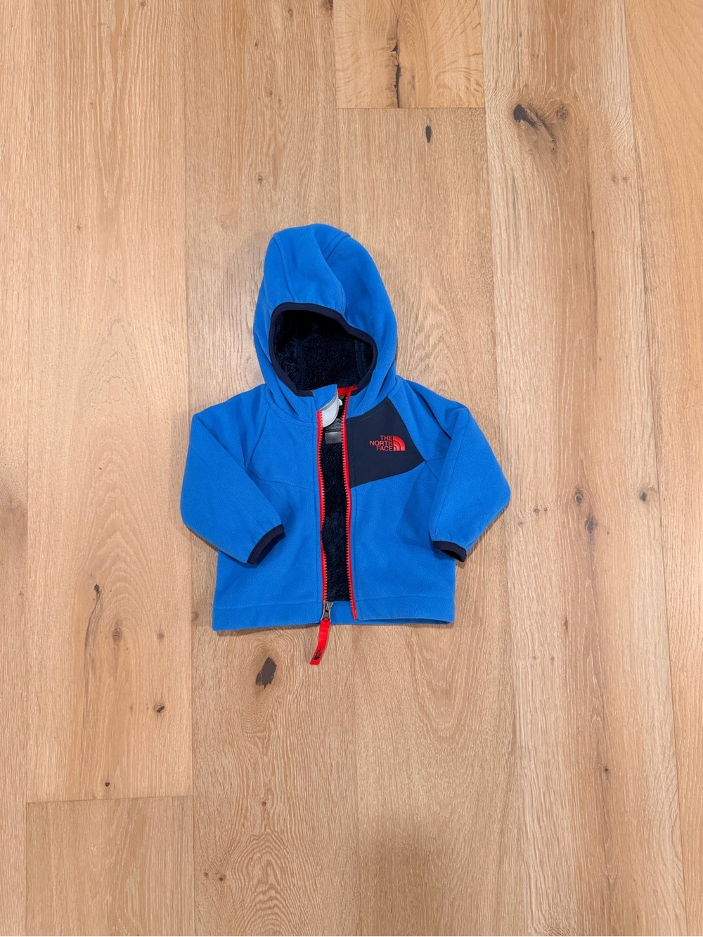 The North Face Royal Blue Kids Hooded Fleece Jacket with Black Panel